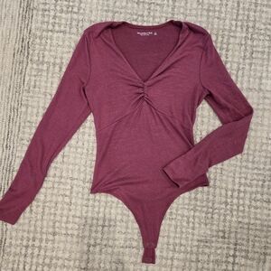 Ambercombie And Fitch Long Sleeve Twist-Front Bodysuit in Deep Berry